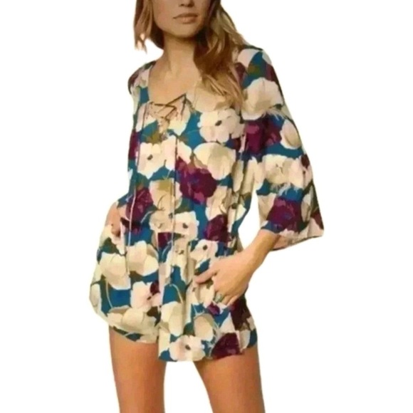 O’Neill Floral Romper with pockets - Picture 1 of 11